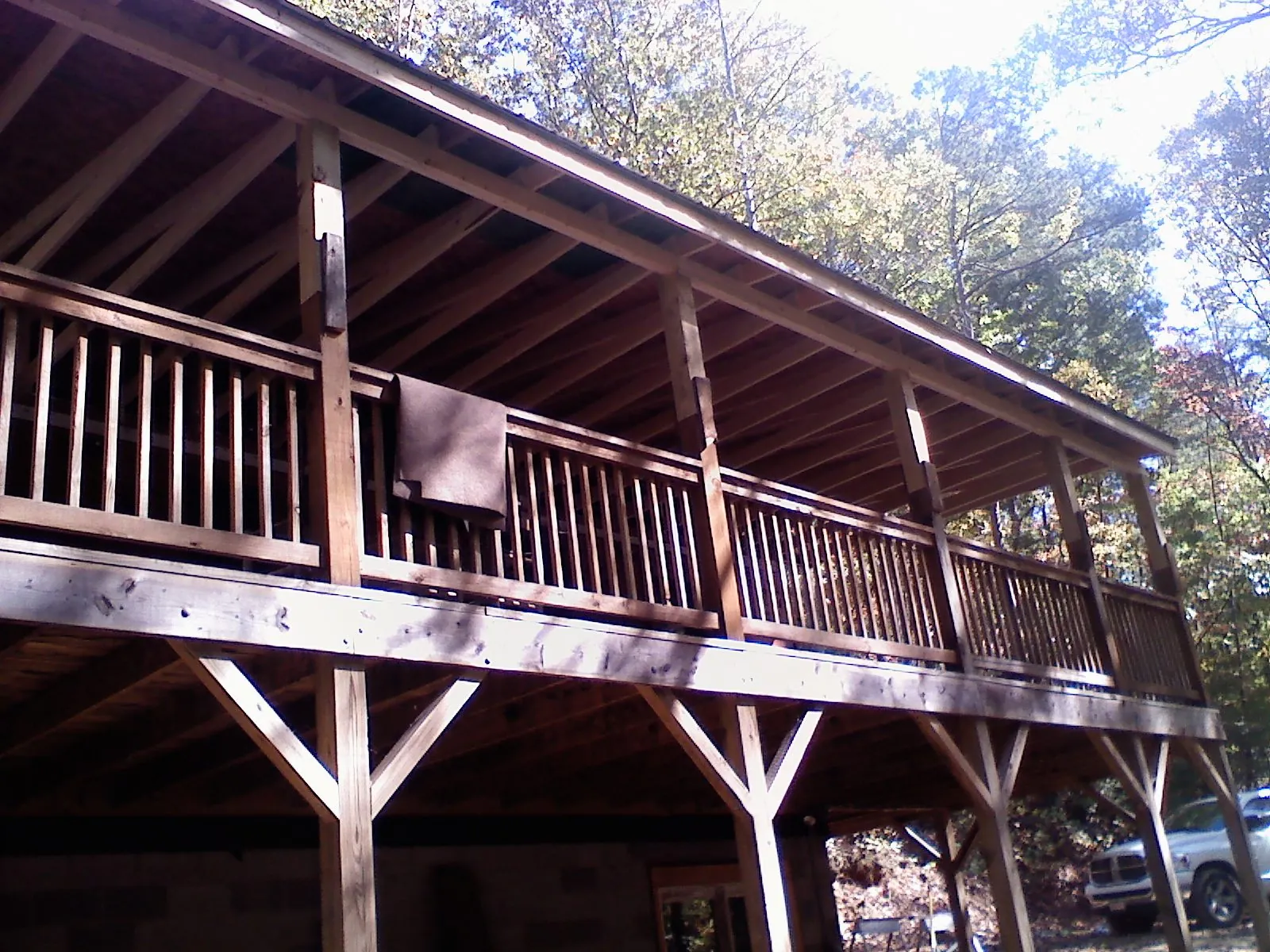 Timber framing under a new elevated porch and deck — Roof Leak Repair in Mc Kinney by Roofing Brothers